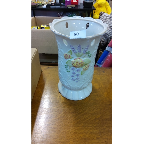 50 - A Belleek Parian glazed porcelain vase, of flared scalloped rim with pierced body and moulded foliat... 