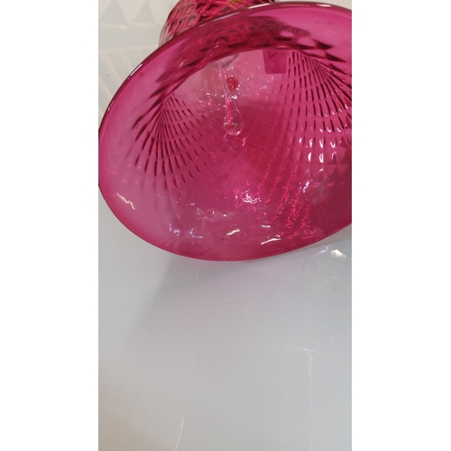 57 - A tall cranberry glass bell