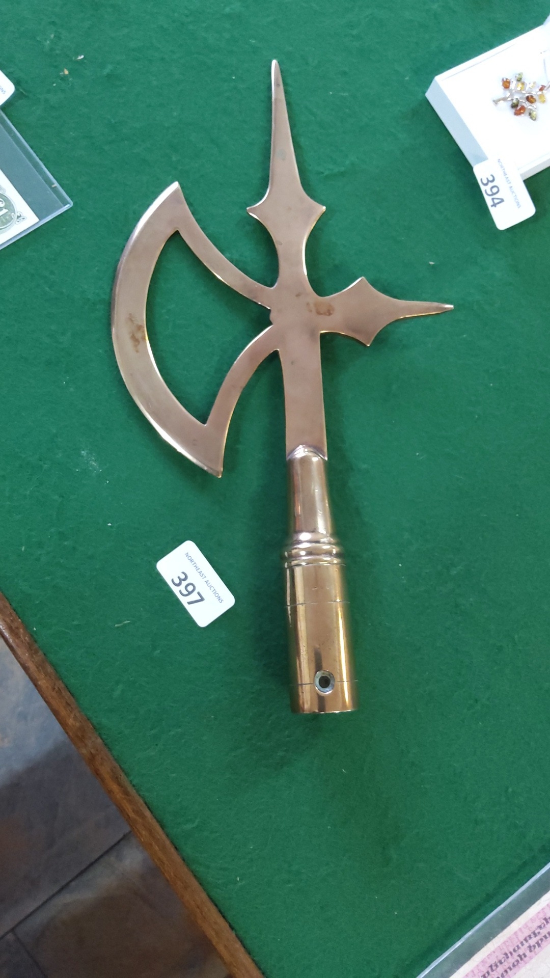 An antique bronze halbert with crescent axe blade