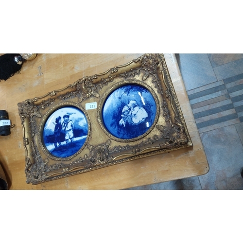A gilt-metal double picture frame, richly cast with Rococo scrollwork ...