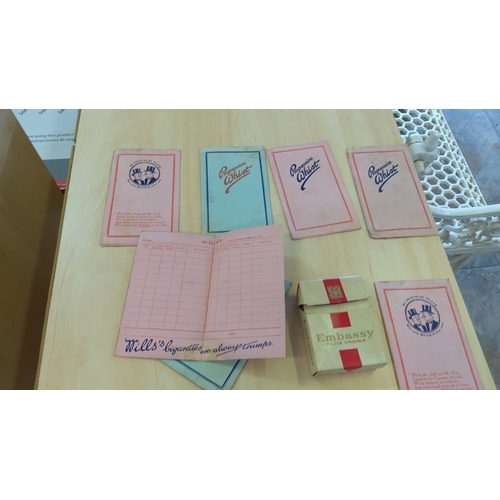 105 - A collection of Wills cigarette-promotional card-game ephemera, including 'Progressive Whist' scorec... 