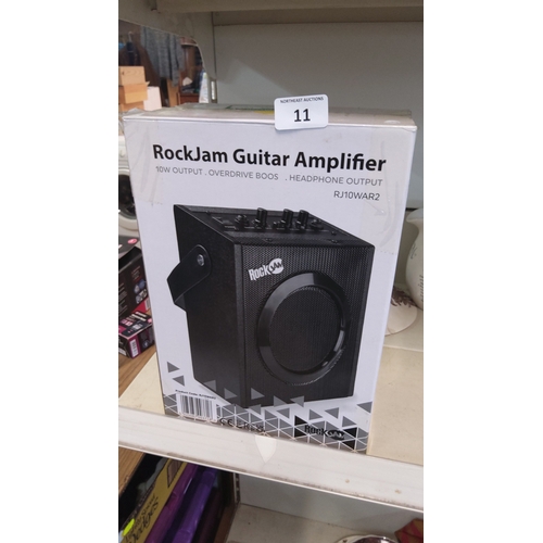 11 - RockJam RJ10WAR2 practice guitar amplifier—10W output with overdrive boost and headphone output.