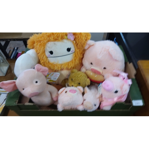 120 - A group of brand new plush toys, predominantly pig-themed, including a large pastel pig holding a do... 