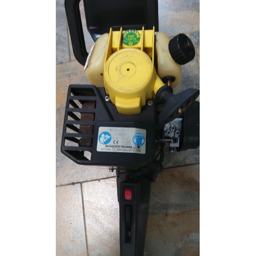 136 - McCulloch petrol hedge trimmer, the black and yellow housing fitted with twin fuel tanks, pull-start... 