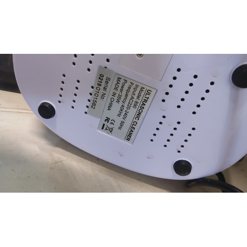 137 - Compact ultrasonic cleaner, model 890, with translucent blue lid and front digital control panel wit... 