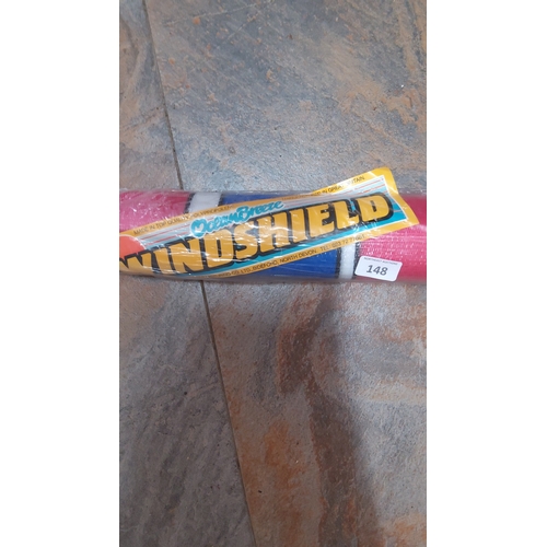 148 - Ocean Breeze beach windbreaker—red and blue striped polypropylene windbreak, in original plastic sle... 