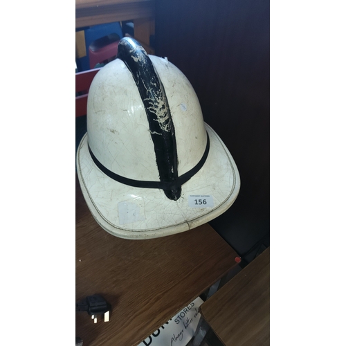 156 - Vintage fire brigade custodian helmet of traditional domed form, white-painted finish with black cen... 