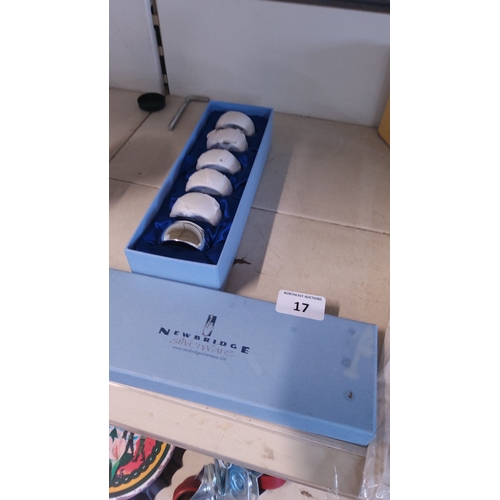 17 - Newbridge silverware—set of six silverplate napkin rings, each of plain D-section band form; present... 