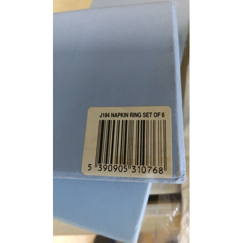 17 - Newbridge silverware—set of six silverplate napkin rings, each of plain D-section band form; present... 