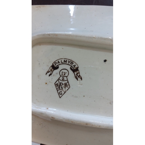 187 - A Victorian Palmyra brown glazed tureen with cover & ladle raised on a matching stand.