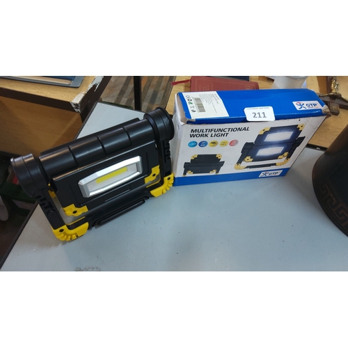 211 - GTP multifunctional LED work light, IP44 rated, in black and yellow moulded casing with folding stan... 
