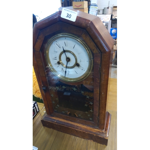30 - Victorian-style walnut mantel clock, the octagonal case with glazed door enclosing an enamel dial wi... 