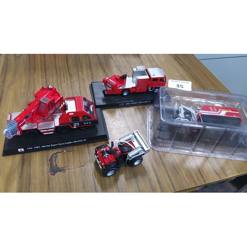 35 - A group of die-cast scale models including a Morita Super Gyro Ladder MLEX5-30 fire appliance on dis... 