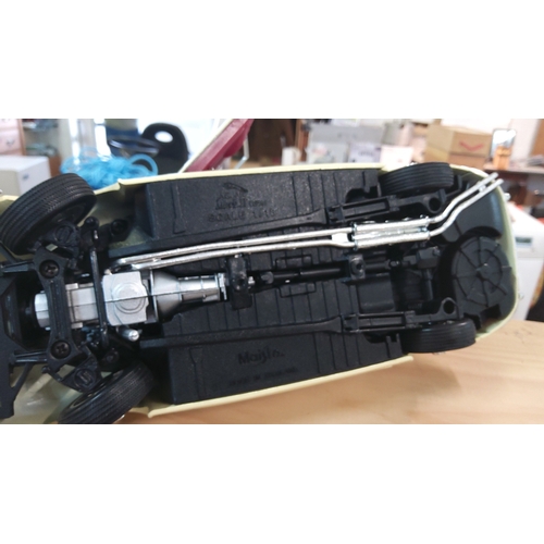 36 - Corgi Toys die-cast model car, after a Jaguar Mark 2 saloon, finished in cream with red interior, op... 