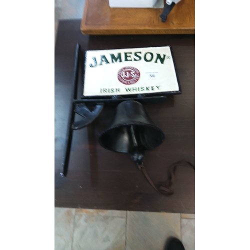 56 - Jameson Irish Whiskey large advertising bell—cast-iron wall-mounted bracket supporting a hanging bel... 
