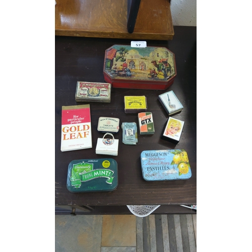 57 - A collection of vintage tins and packets, including an octagonal painted tin with Orientalist market... 