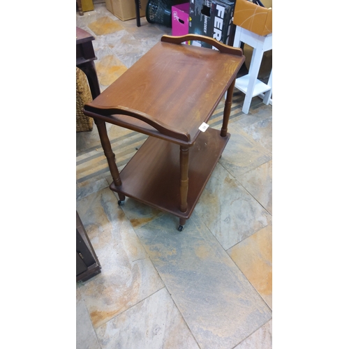 59 - Twentieth-century stained wood sweet trolley, the rectangular top with raised gallery ends above an ... 