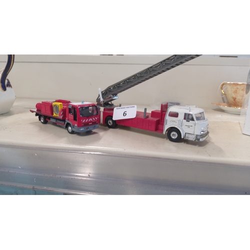 6 - A group of model fire service vehicles, comprising a red Mercedes-Benz fire appliance with roof equi... 