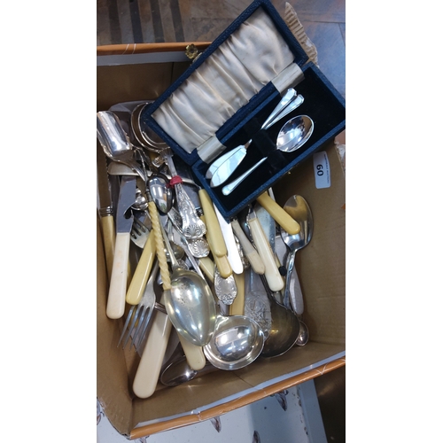 60 - A quantity of silver-plated flatware and serving pieces, including assorted spoons, forks, knives wi... 