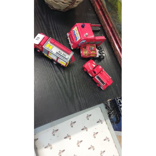 61 - A group of 4 vintage toy fire-service vehicles