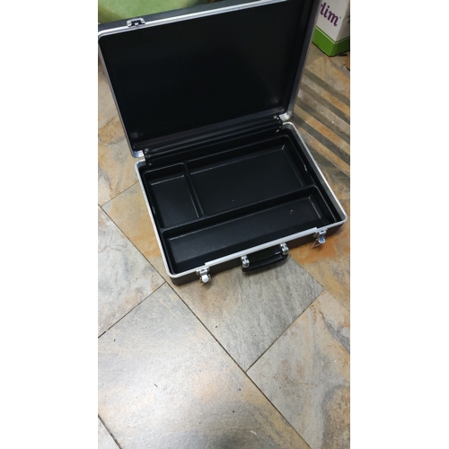 72 - Hard-sided carrying case in black with aluminium edging, twin chrome clasp closures and central hand... 