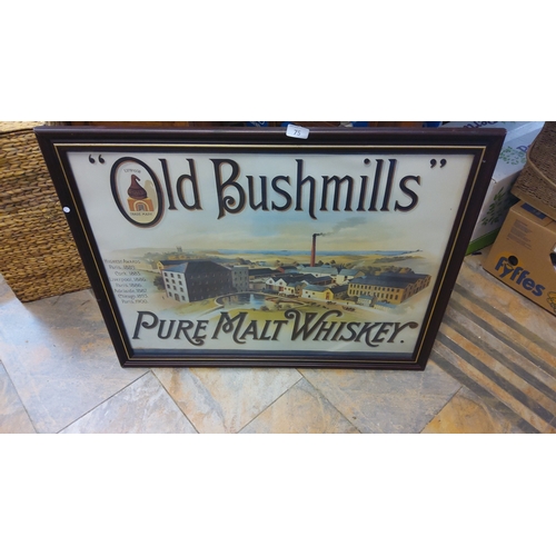 75 - Old Bushmills Pure Malt Whiskey advertising print, printed with the distillery view and award list, ... 