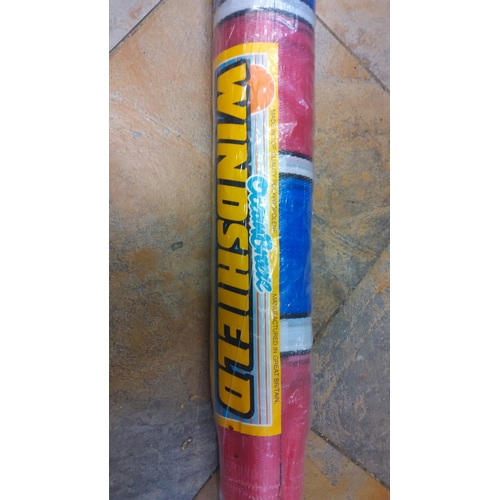 79 - A large beach wind breaker with four staggered poles (new)