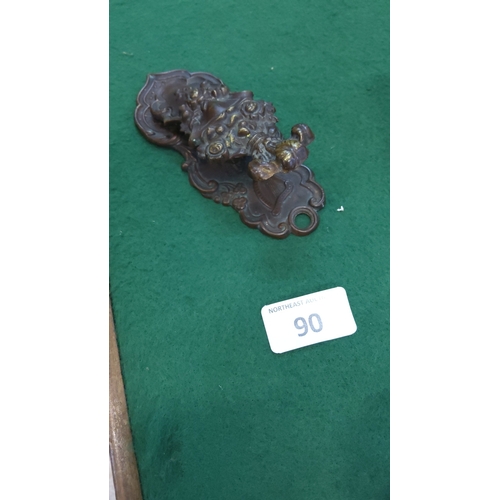 90 - Art Nouveau-style cast metal document holder, the shaped backplate modelled with scrolling foliate r... 