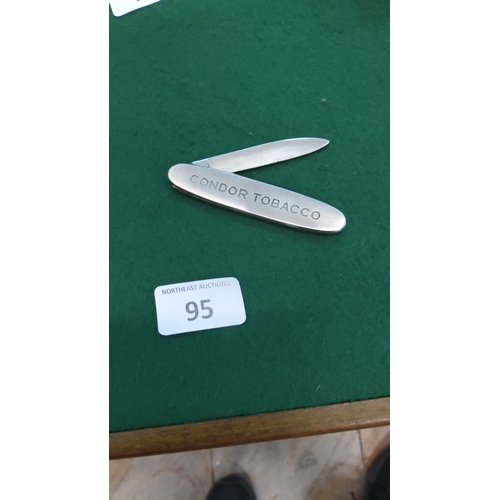 95 - Advertising pocket knife, the aluminium handle engraved CONDOR TOBACCO; single folding steel blade.