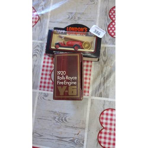 386 - A group of boxed die-cast fire engines, including a 