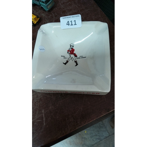 411 - Johnnie Walker advertising ceramic ashtray of square form with rounded corners, printed with the Str... 