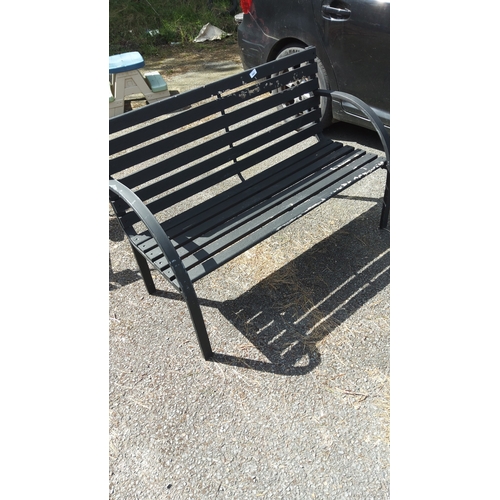 481 - Contemporary black-painted slatted garden bench, the back and seat formed of horizontal boards withi... 
