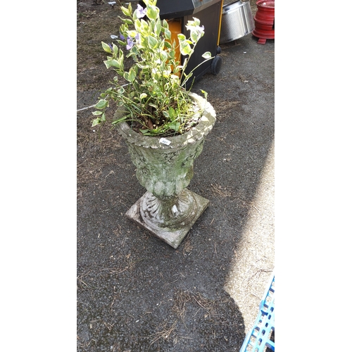 487 - Cast composition stone garden urn, the campana bowl with moulded fruiting vine relief and gadrooned ... 
