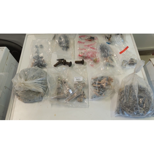 505 - An assortment of hardware fittings and fasteners comprising bagged nuts, bolts, screws and assorted ... 