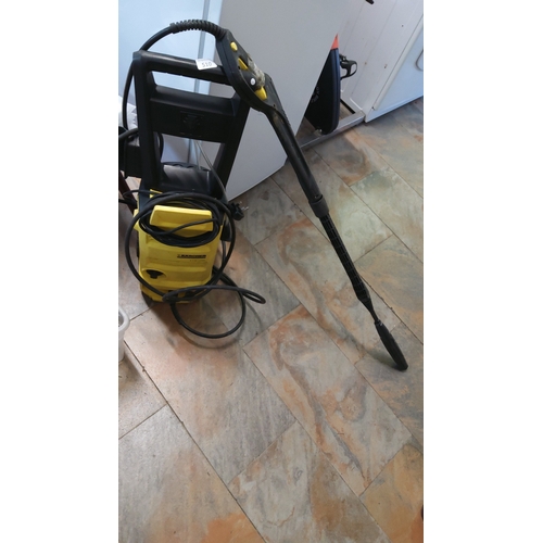510 - Kärcher K 3.65 Jubilee electric pressure washer, the yellow plastic body on wheels with integral han... 