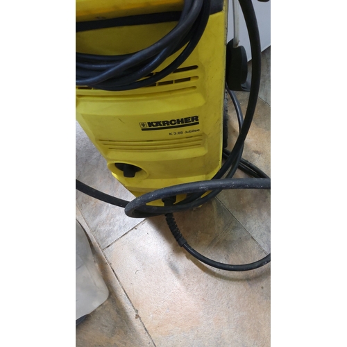 510 - Kärcher K 3.65 Jubilee electric pressure washer, the yellow plastic body on wheels with integral han... 