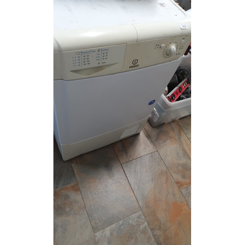 512 - Indesit freestanding condenser tumble dryer with moulded white case and drop-front door, the control... 