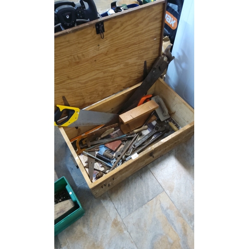 514 - A quantity of workshop tools and hardware in a pine tool chest, including saws, files, clamps, chise... 