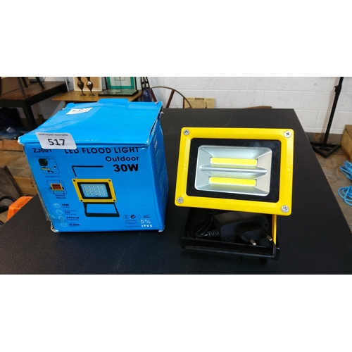 517 - Portable outdoor LED flood light, model ZJ601, 30W—yellow metal housing with twin COB strips behind ... 