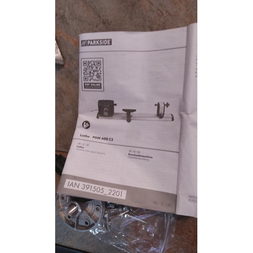 518 - Parkside PDM 600 C3 mini woodturning lathe with metal bed and green motor housing, including instruc... 