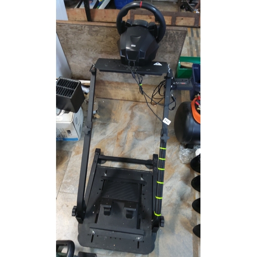 521 - Xbox-compatible force-feedback racing steering wheel with matching pedal unit, mounted on an adjusta... 