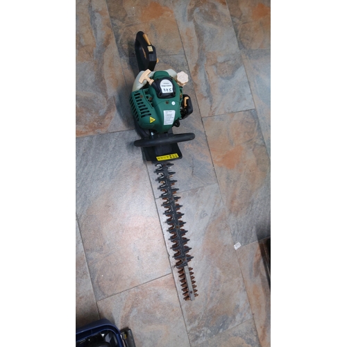 524 - Petrol hedge trimmer with green and black housing, recoil starter, wraparound front handle, and doub... 