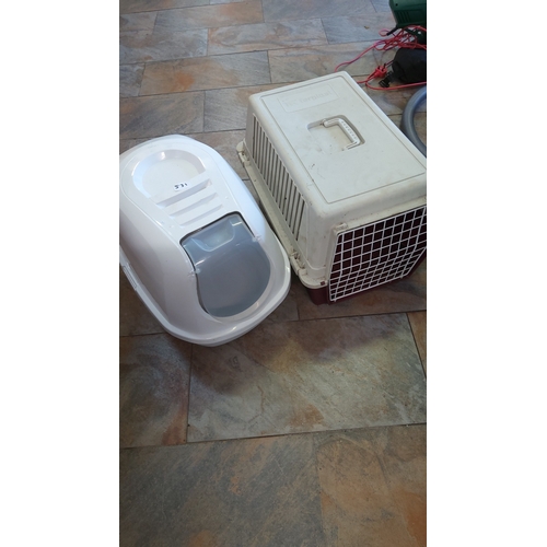 531 - A modern plastic pet carrier of rectangular form with swing handle, louvred sides and metal grille d... 