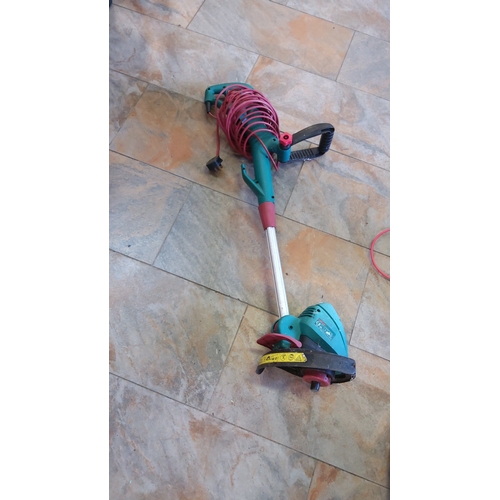 532 - Bosch electric grass trimmer, model ART 25 COMBITRIM, with auxiliary handle and adjustable shaft, in... 