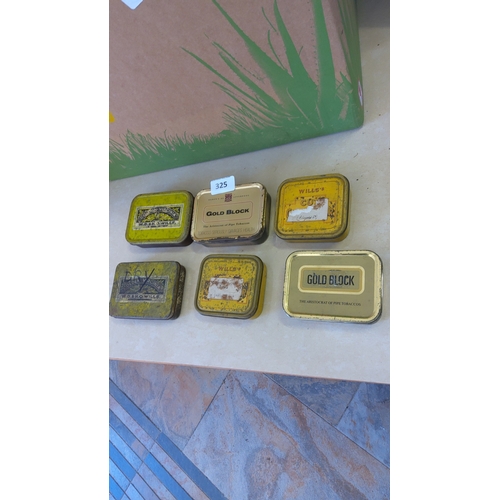 A group of W.D. & H.O. Wills metal tobacco tins, including Golden ...