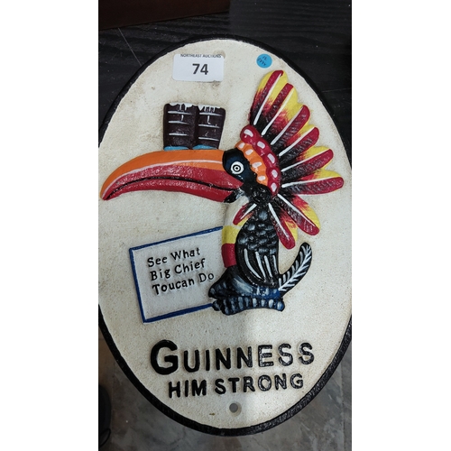 Guinness painted cast-iron advertising plaque of oval form, depicting a ...