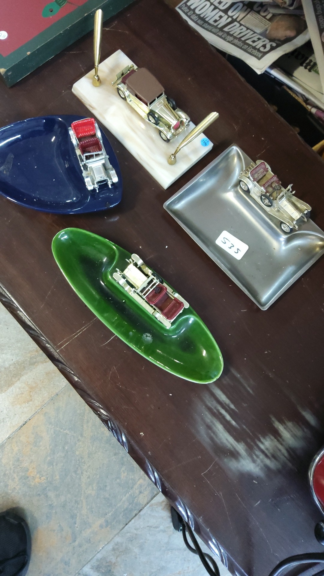 A group of vintage-car desk accessories: three shaped trays in blue ...