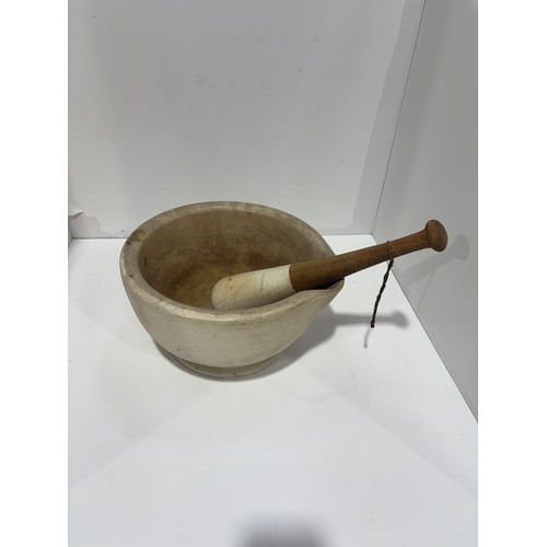Antique Mortar and Pestle.  29cm diameter, 15cm high
Condition.  Excellent, UK shipping available but is very heavy.
