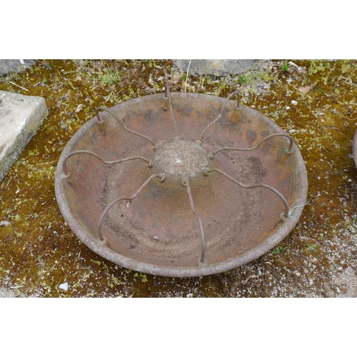 185 - A cast iron circular pig trough