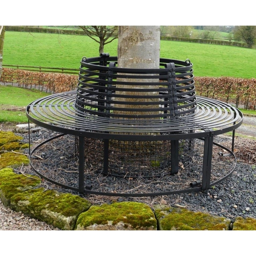 204 - A wrought iron tree seat 78x37